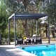 Pergola Bioclimatique aluminium anthracite 10,80 m2 et Toit avec lames ovales Habrita